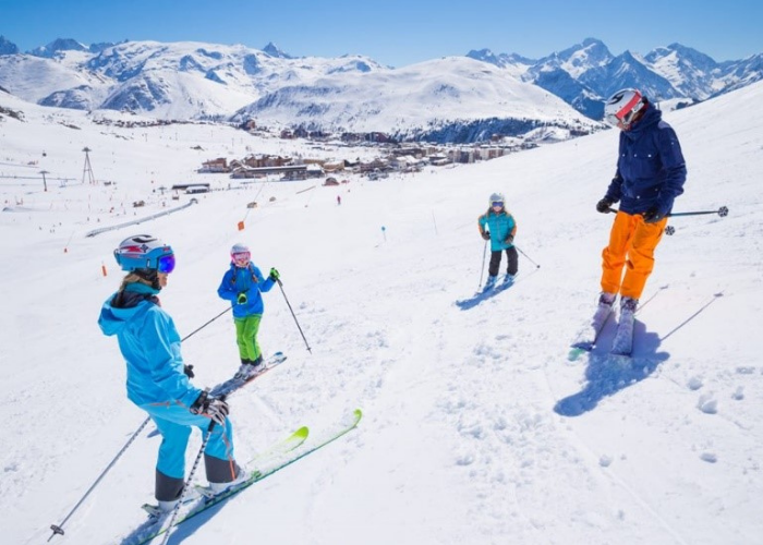 Family skiing on the slopes