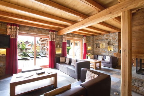 Wolf Lodge, Les Deux Alpes (self catered chalet) - Spacious living area with fireplace
