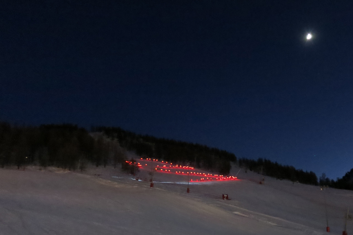 Skiing in Montgenevre: Torch-lit Descent