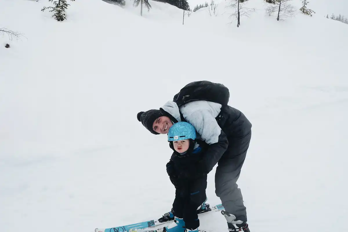 Family skiing in Valmorel: Teaching their child how to ski